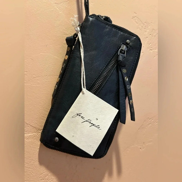 Free People Handbags - FREE PEOPLE Black Distressed Leather Wristlet Wallet. Brand new with tags